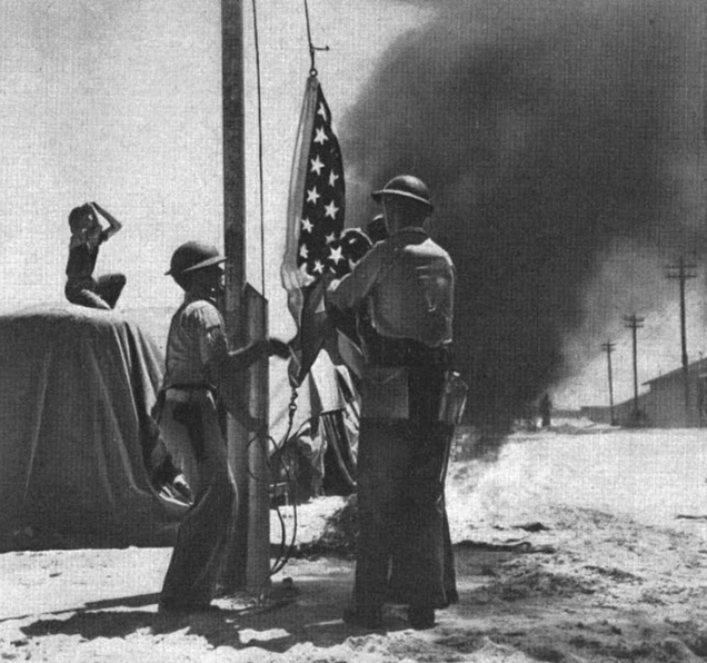 The attack on Midway began as US soldiers were in the middle of the morning flag-raising ceremony. (US Navy)